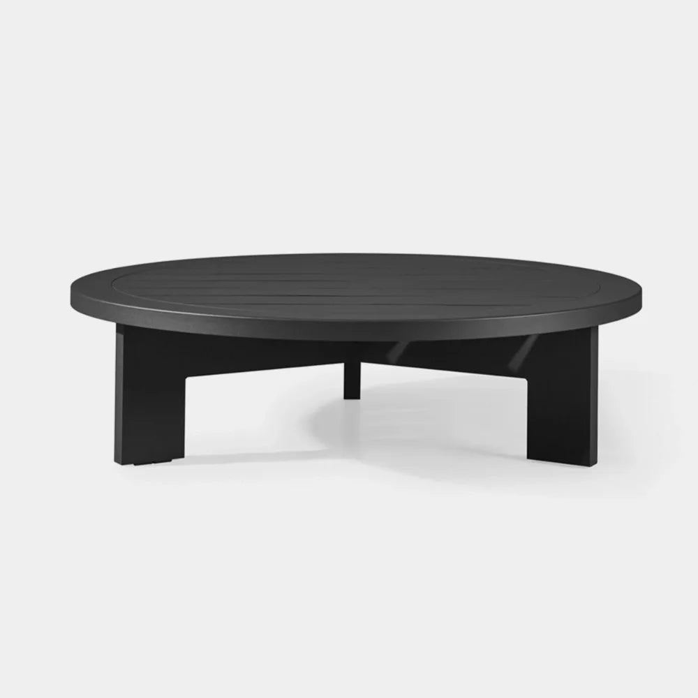 A stylish black aluminum coffee table with a round base, perfect for contemporary home decor.