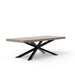 Gray rectangular outdoor dining table with a concrete top and black, angular metal legs forming a crossed base design on a white background