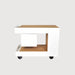 Two-toned wooden shelf with wheels on a light gray background