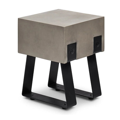 Gray square concrete outdoor side table or stool with black steel legs on white background