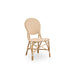 Natural rattan outdoor dining side chair featuring beige and white chevron woven wicker seat and back.