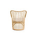 Natural rattan outdoor lounge chair viewed from the rear featuring an open woven back and curved base rails.