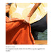 A person on a boat holds up an orange throw blanket with a white patterned top and dark shorts visible. Text at the bottom reads, 'Simple to Carry An integrated handle makes the Laze Pillow equally luggable and lovable.