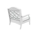 A white high density plastic armchair with a decorative lattice backrest and a white cushioned seat, shown from a three-quarters angle on a solid white background.