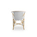 Rear view of white rattan outdoor dining armchair featuring a black and white woven wicker seat and back.