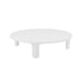 A minimalist round white table with four blocky legs, shown against a seamless white background.