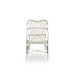 White rattan outdoor dining armchair featuring an open slatted back, woven seat and curved arms.