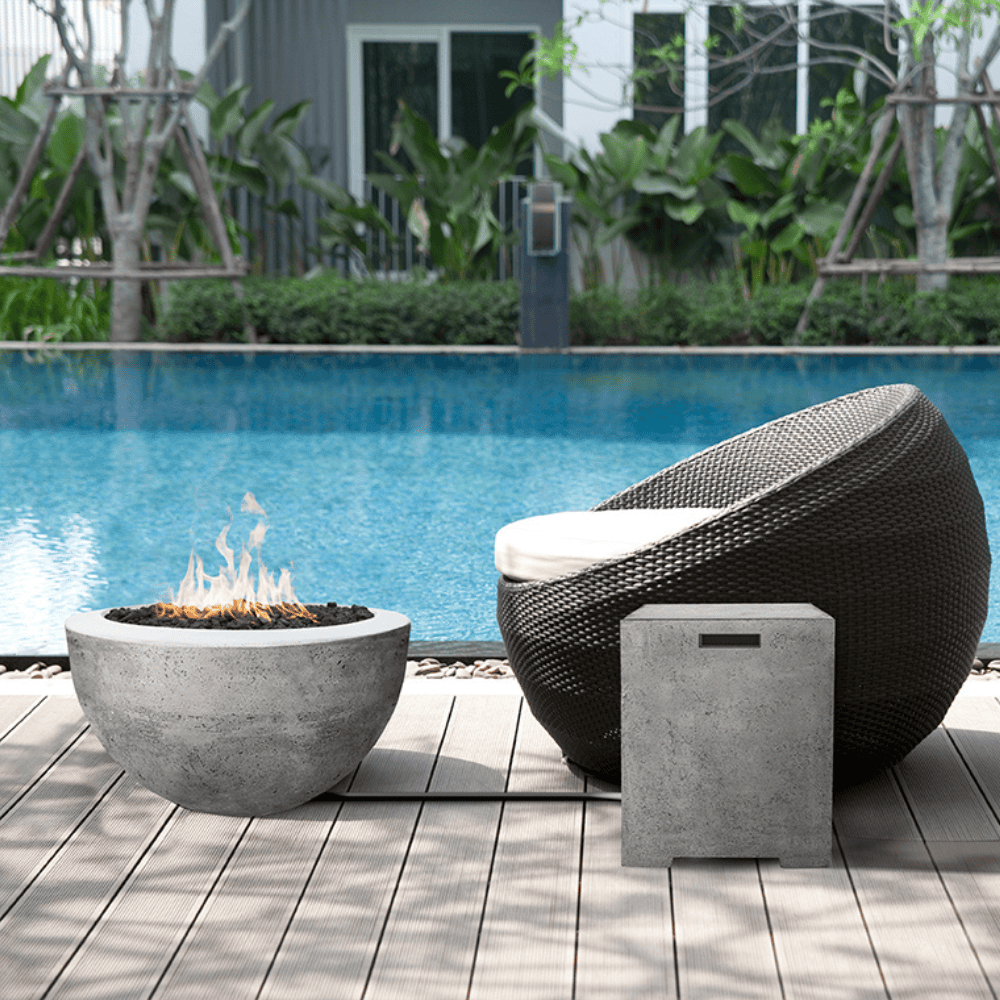 Moderno 3 outdoor concrete round fire bowl is a 30" diameter fire bowl beside the pool