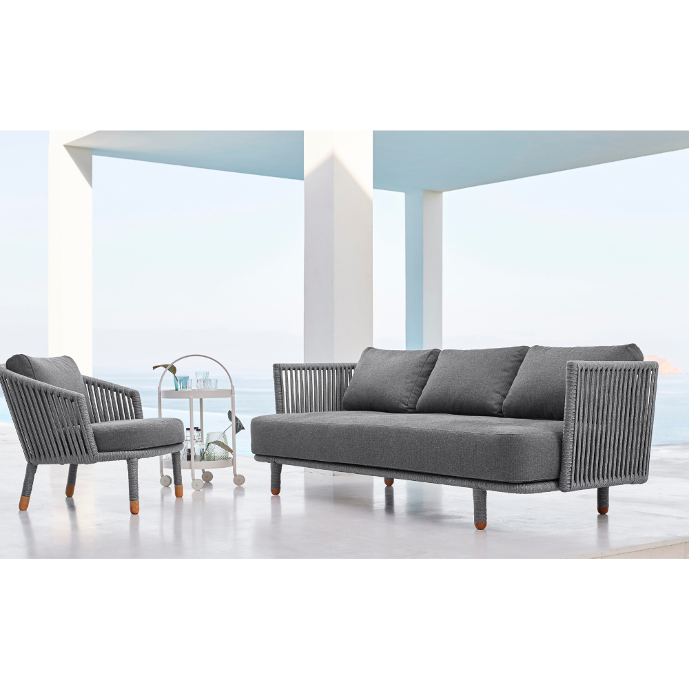 Boxhill's Moments Outdoor Lounge Chair lifestyle image with Moments 3-Seater Sofa beside the pool