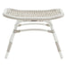 White rattan outdoor footstool in a white finish with a woven wicker seat.