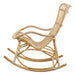 Natural rattan outdoor rocking chair viewed from the side with an open slatted back and rocker rails.
