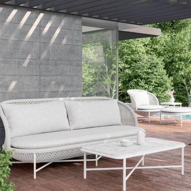 Boxhill's Montauk 3 seat Outdoor Sofa lifestyle image with Hampton Coffee Table, Montauk Club Chair and Montauk Ottoman
