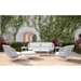 Boxhill's Montauk Outdoor Club Chair lifestyle image with Montauk 3 Seat Sofa, Montauk Ottoman, and Hampton Coffee Table and Side Table at outdoor garden