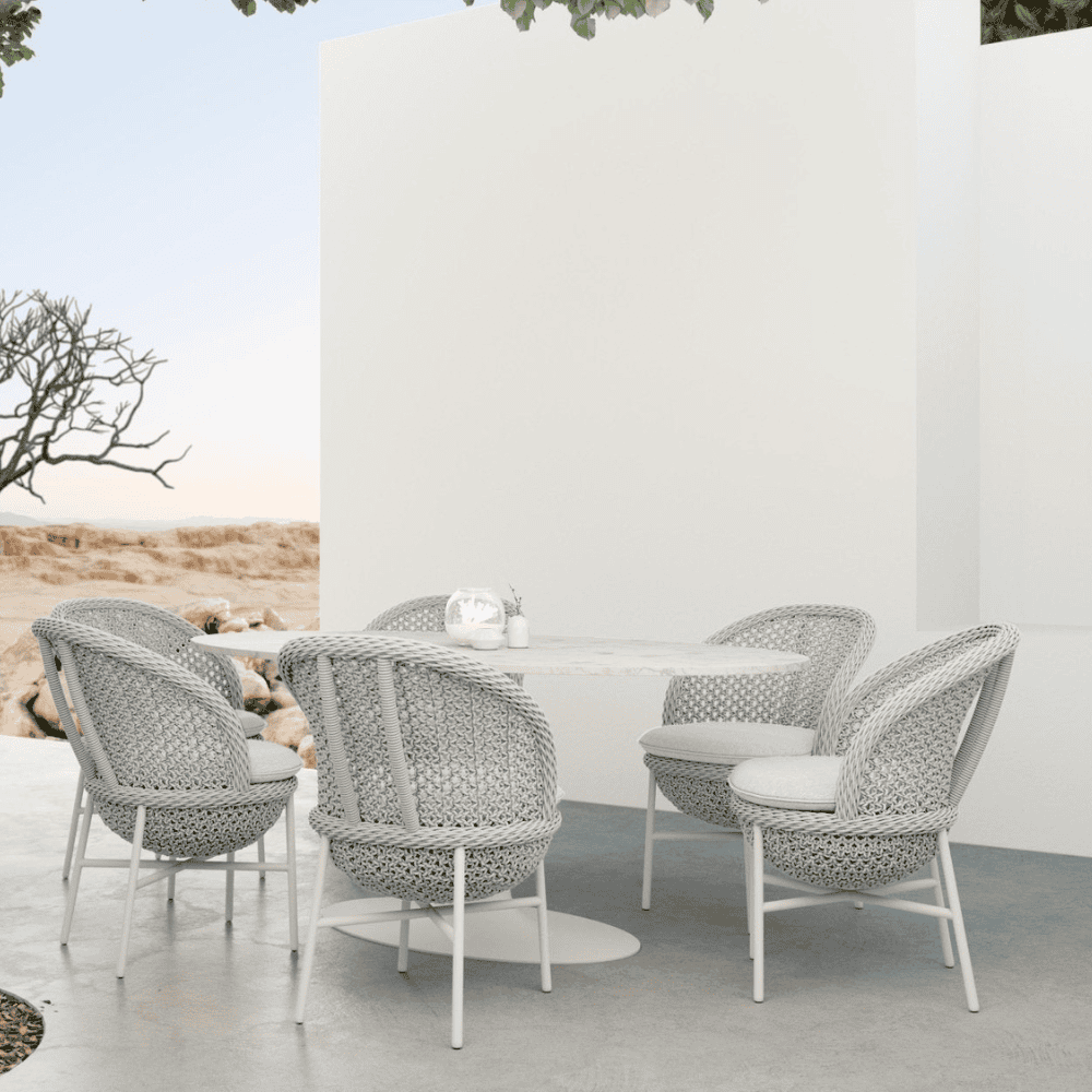Boxhill's Montauk Outdoor Dining Chair lifestyle image with dining table