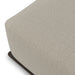Square outdoor ottoman in beige fabric with bronze aluminum base, compact design, close-up view