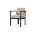 An aluminum dining jchair with a black frame and beige quick dry upholstery, combining elegance and comfort in its design with its elevated barrel-back profile, deep seat, and wide arms.