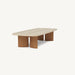 Modern outdoor coffee table with wooden legs and a stone-like top.