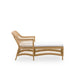 Natural rattan outdoor chaise lounge viewed from the side with a white cushion and open woven frame.