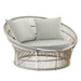 Gray rattan outdoor round lounge chair with gray cushions and an open woven frame.