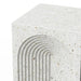Close-up of white terrazzo concrete outdoor stool with a carved arched pattern on a white background