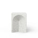 Square white terrazzo concrete outdoor stool with a carved arched pattern on a white background
