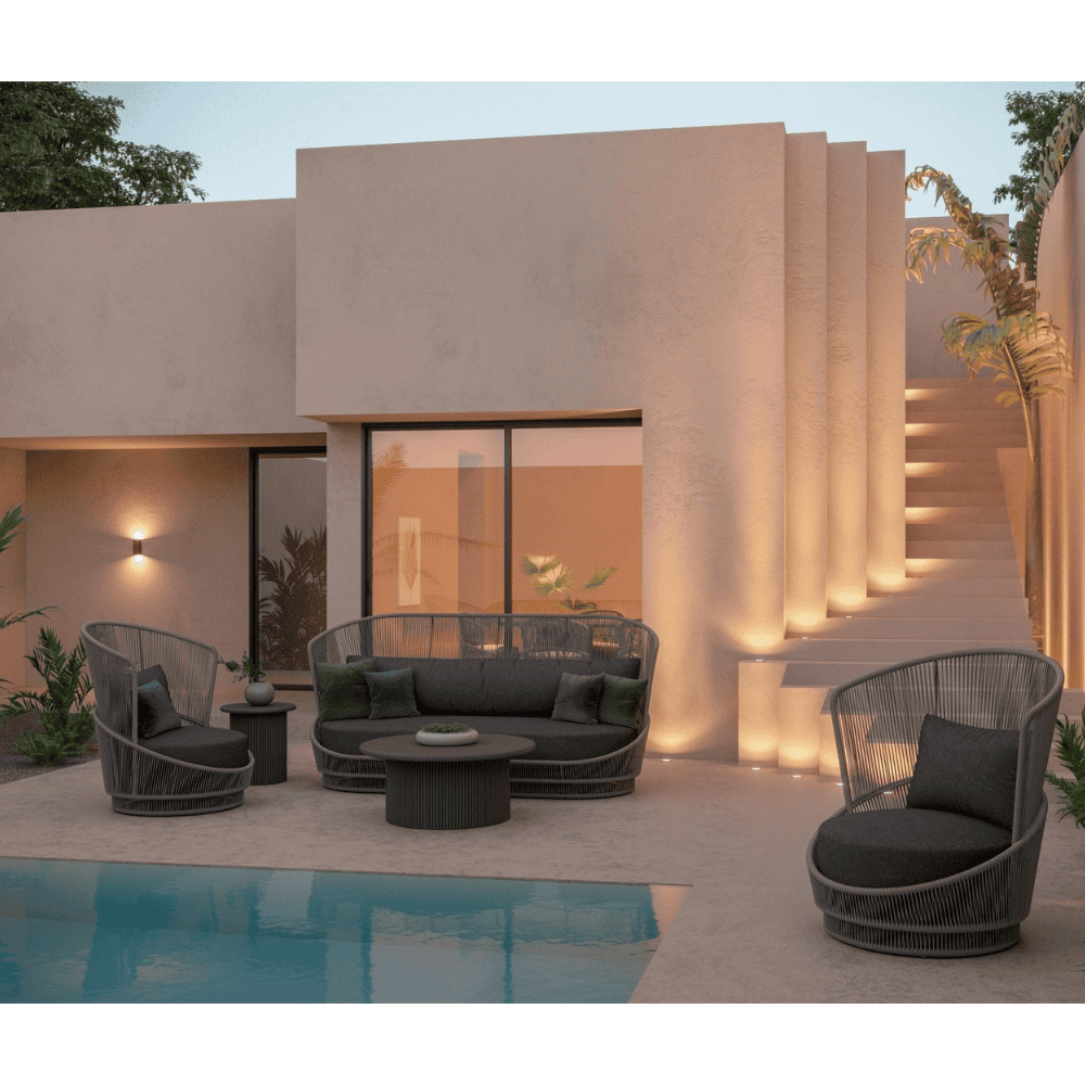 Boxhill's Palma 3 Seat Outdoor Sofa Mocha lifestyle image with Palma Swivel Club Chair and Palma Coffee Table and Side Table at pool side