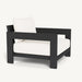A black aluminum lounge chair featuring plush white cushions, designed for comfort and style in a modern setting.
