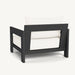 A black and white aluminum lounge chair featuring white cushions, showcasing a modern and minimalist design.