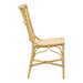 Natural rattan outdoor dining side chair featuring an open woven back viewed from the side.