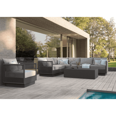 Boxhill's Porto Outdoor Club Chair Charcoal lifestyle image with Porto Sectional Sofa and Porto Coffee Table
