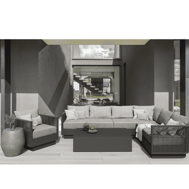 Boxhill's Porto Outdoor Coffee Table Charcoal lifestyle image with Porto Sectional Sofa, Porto Club Chair, and Durban Side Table
