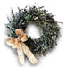 Decorative rustic eucalyptus wreath with a natural burlap bow