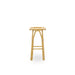 Natural rattan outdoor bar stool featuring a woven seat viewed from the side.