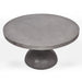 Gray round concrete patio dining table on a white background