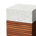 Close view of modern square outdoor side table or stool with a white speckled concrete top and slatted wooden base on a white background