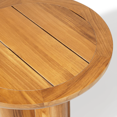 Wooden round outdoor side table with slatted top. 