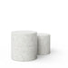 Two white speckled cylindrical concrete outdoor side tables in different sizes on a white background