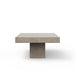 Side view of gray concrete rectangular outdoor coffee table on a white background