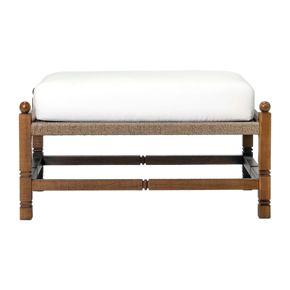 Wooden outdoor ottoman with a white cushion on top.