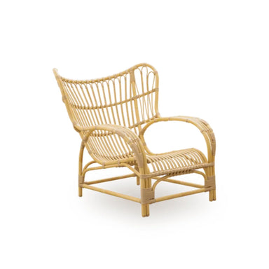 Natural rattan outdoor lounge chair featuring a sculptural woven frame and curved armrests.