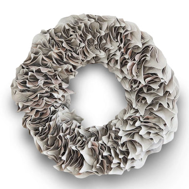 Decorative white lacquer wreath on a plain white background.