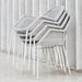 Boxhill's Breeze Stackable Dining Armchair (Set of 2) White Grey lifestyle image stacked pile view