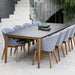 Boxhill's Aspect Dining Table Fossil black lifestyle image beside stairs