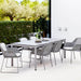 Boxhill's Breeze Dining Weave Chair Light Grey lifestyle image with dining table 