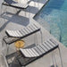 Boxhill's Breeze Stackable Sunbed lifestyle image beside the pool