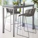 Boxhill's Moment Outdoor Bar Chair lifestyle image with bar table at patio