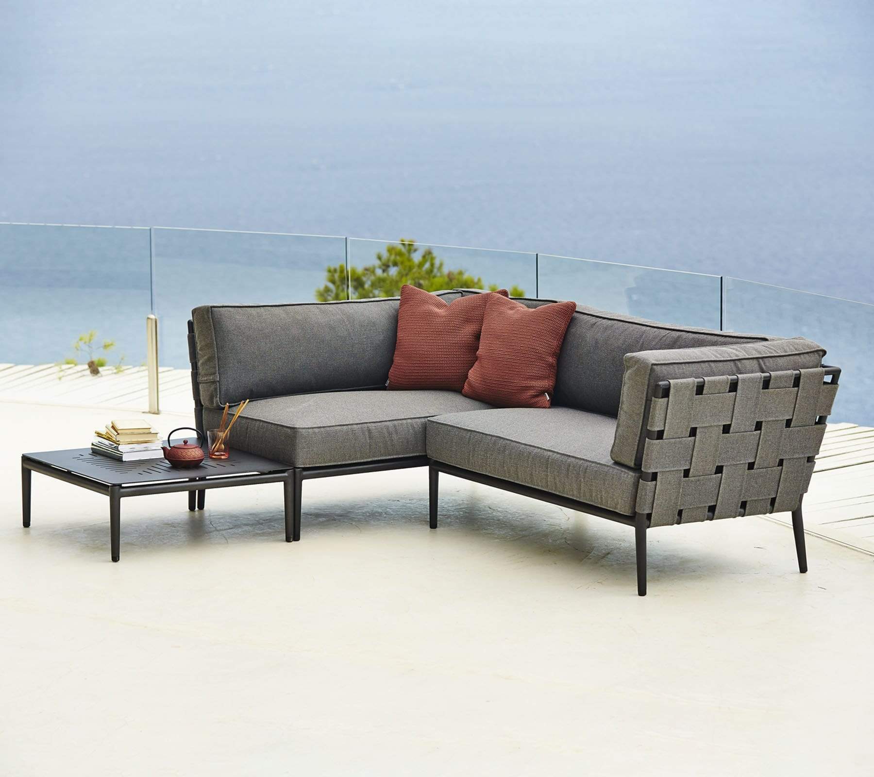 Boxhill's Conic Outdoor Coffee Table Grey lifestyle image with Conic Sectional Sofa 