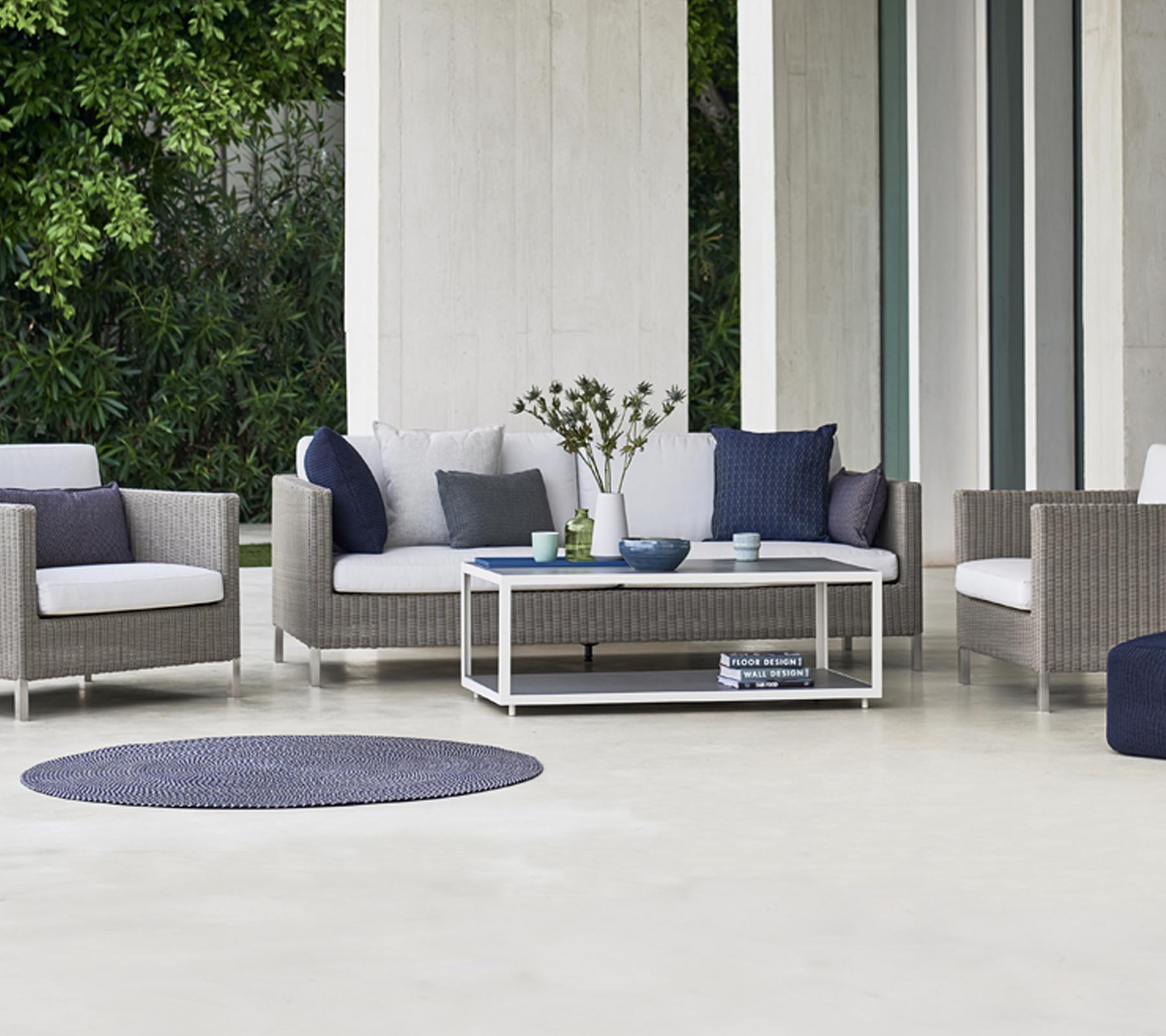 Boxhill's LEVEL Rectangle Coffee Table lifestyle image with 3-seater sofa and 2 lounge chair at patio
