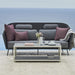 Boxhill's LEVEL Rectangle Coffee Table lifestyle image with 3-seater sofa beside the pool