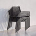 Boxhill's Edge Stackable Outdoor Armchair lifestyle image piled up